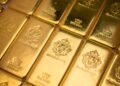 Gold and silver prices continued to fall as the U.S. dollar rose during Monday’s trading